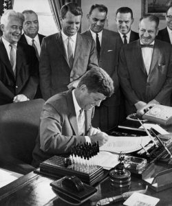 Kennedy Signs Bill